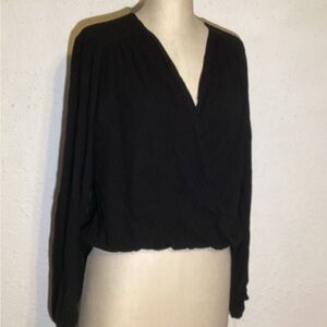 Free people black blouse size XS